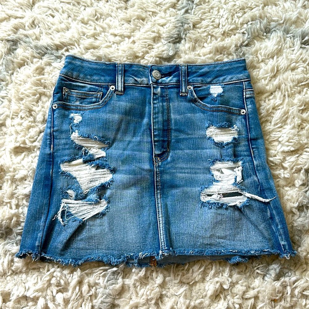 Distressed denim skirt